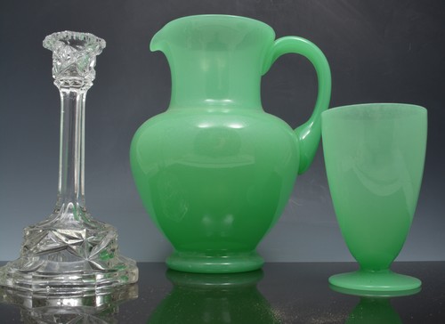Six Brierley crystal zodiac goblets, engraved, 15cm, a green glass jug and two beakers,