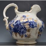 Staffordshire toilet jug, floral decoration in under glaze blue, 28cm, a basin and another jug (3).