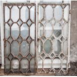 Five metal windows, octagonal section, 89cm x 40cm,