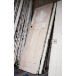 Painted pine and panelled door, 198cm x 75cm and five other stained and painted doors, (6).