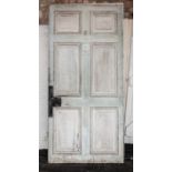 Two Victorian painted pine doors, each with six fielded panels,