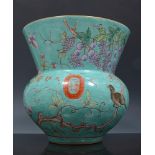 Chinese turquoise ground vase, six character mark, slightly squat form, decorated with flowers,