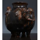 Chinese brown glazed Earthenware temple jar, of elephant form, 13cm.