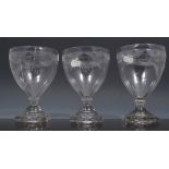 Three George III glass rummers, engraved funnel bowls with monograms, square bases, 14cm.