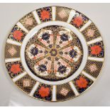 Royal Crown Derby plate, Old Imari pattern, diameter 27cm and two others, smaller (3).