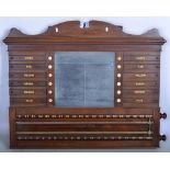 Mahogany snooker score board, shaped pediment, with a slate panel inset, width 102cms.