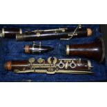 French rosewood clarinet, marked - Cabart a Paris, cased.