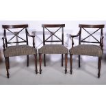 Set of eight Regency style mahogany dining chairs, broad crestings with reeded outlines,
