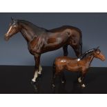 Beswick model of a chestnut stallion, 30cms and a Beswick model of a New Forest pony, (2).