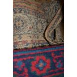 Belgian cotton rug, with central medallion and floral scrolled borders,