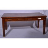 Mahogany writing table, rectangular top with a tooled leather inset, fitted with two frieze drawers,