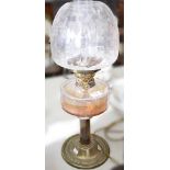 Brass oil lamp, clear glass reservoir, complete with shade and chimney,