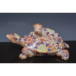 Chinese porcelain model of a turtle and monkey, length 35cms.