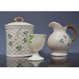 Belleek basket weave moulded preserve pot, decorated with shamrocks, 13cms a similar vase,