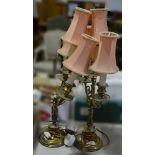 Pair of plated three-light candelabras, adapted as table lamps, twin-scrolled branches,