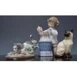 Lladro figure of a girl grooming of her dog, 19cms, boxed, a small Lladro model of a poodle, boxed,