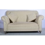 Traditional settee, reupholstered in fawn coloured cotton, with a single drop end, length 145cms.