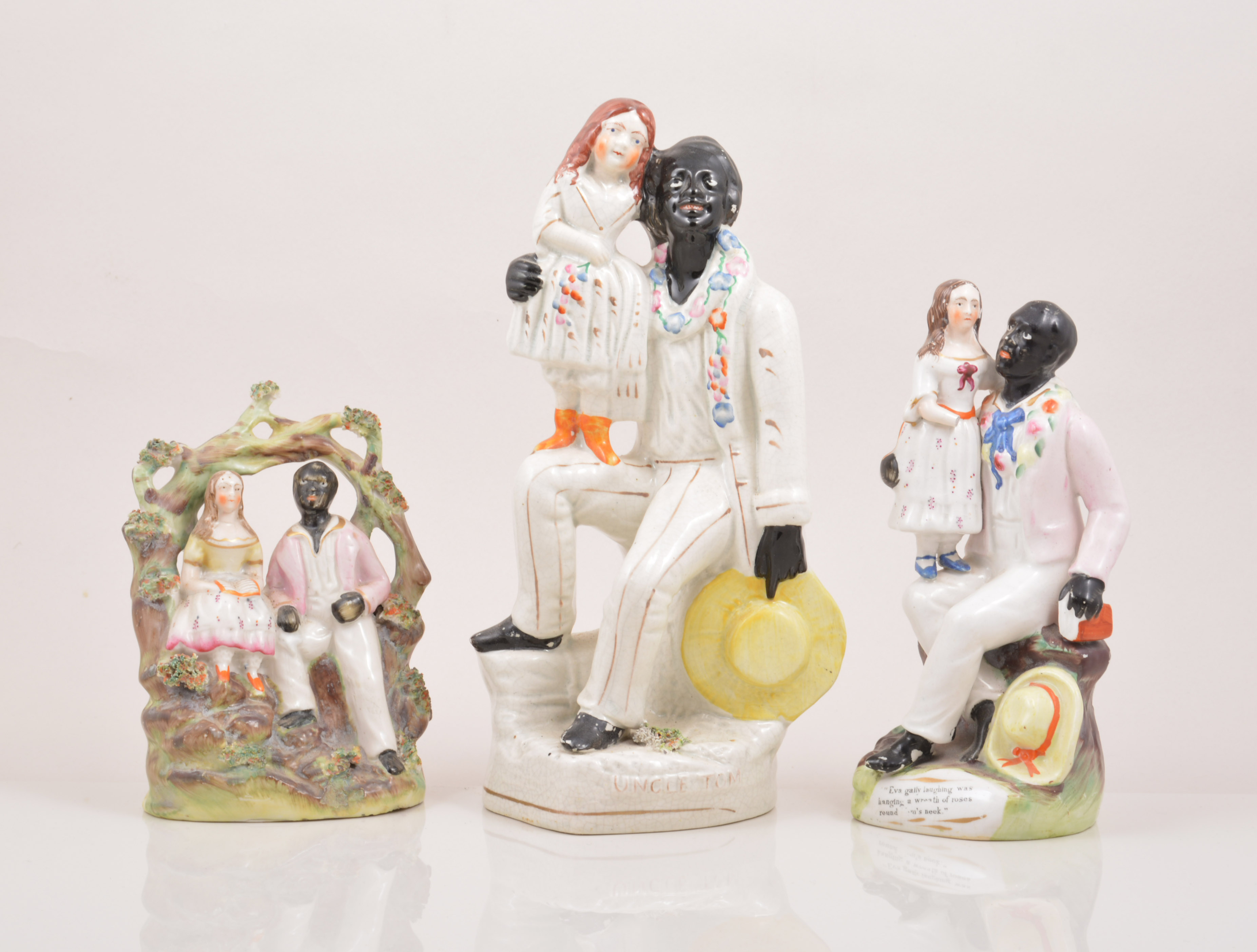 A Staffordshire pottery group of Uncle Tom and Eva, attributed to Thomas Parr, 1850's,