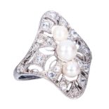 A rose diamond and pearl set Art Deco style dress ring, three pearls vertically set,