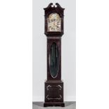 An Edwardian ebonised longcase clock, arched brass dial with a silver chapter ring,