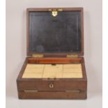 A Victorian brown leather writing box, double hinged, black leather interior,