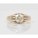 A gentleman's diamond set yellow metal ring, old brilliant cut cushion shaped stone, approx. 1.