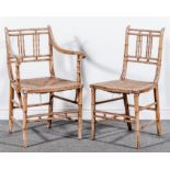 A set of five Regency style simulated bamboo dining chairs, painted detail (badly rubbed),