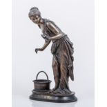 Buzel
"Souffleuse de balles",
patinated bronze figure of a classical maiden with a basket,
22cm.