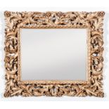 A rectangular wall mirror, Florentine style carved giltwood and gesso frame,