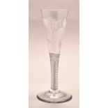 A Jacobite style ale flute, funnel bowl engraved with a rose and single bud,