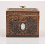 A George III rolled paper and mahogany shaped tea caddy,