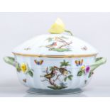 A Herend porcelain dinner service, decorated with birds, butterflies and insects,