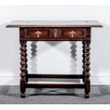 A joined oak side table, 18th Century, rectangular top with a moulded edge,