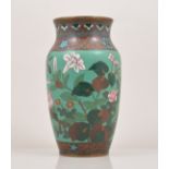 A Pair of Chinese cloisonne green ground  baluster shape vases, decorated with irises,