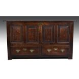 A joined oak mule chest, basically early 18th Century, boarded top,