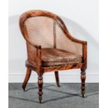 An early Victorian simulated rosewood library chair, of small size, hoop back,