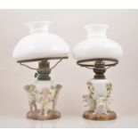 A German porcelain lamp base, Sitzendorf, circa 1900, ovoid reservoir encrusted with rose sprigs,