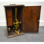 A Victorian lacquered brass microscope, Watson & Son, rack and pinion focusing, platform engraved,