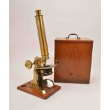 A Victorian lacquered brass microscope, by W.