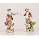 A pair of Derby porcelain figures, The Dresden Shepherds, late 18th Century,
