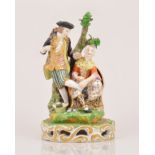 A Derby porcelain group, The Stocking Mender, early 19th Century,