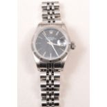 A lady's Rolex Oyster Perpetual wristwatch, black baton dial with date aperture and sweep seconds,