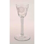 A Jacobite style wine glass, rounded funnel bowl, engraved with a rose and two buds,
