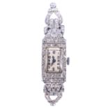 A lady's Art Deco diamond set white metal cocktail watch, rectangular silvered dial,