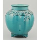 Chinese turquoise glazed vase, decorated with stylised Oriental flowers to the top,