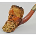 Victorian carved Meerschaum pipe, in the form of a bearded gentleman, in a fitted leather case,