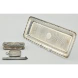 Rectangular silver tray, Birmingham 1918, a silver embossed pill box, Birmingham 1906,