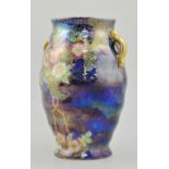 Maling pottery vase, lustre decorated with flowers on a blue ground, gilt handles, height 24cm.