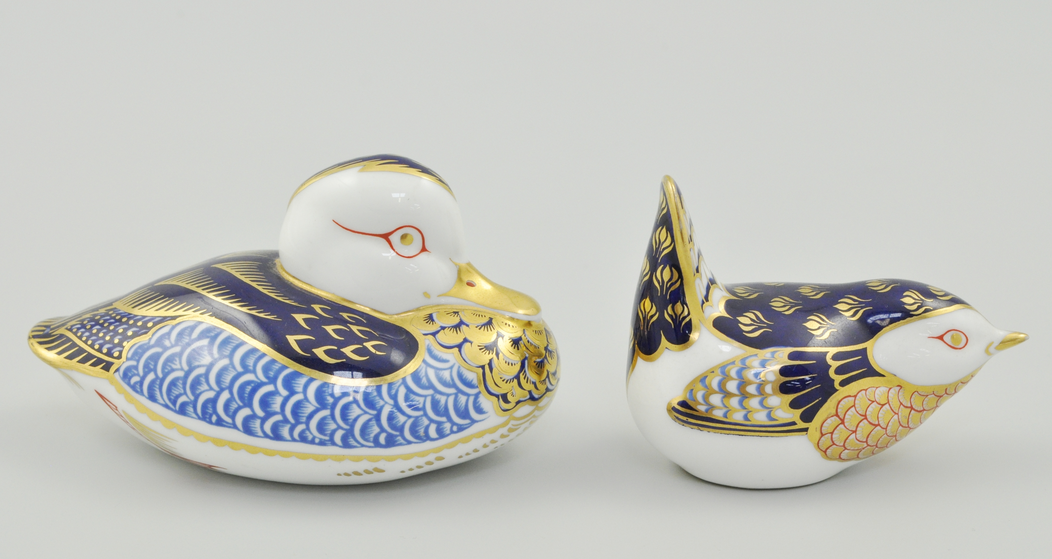 Royal Crown Derby "Imari" pattern paperweight, modelled as a Wren and another of a Duck,