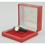 Lady's 9ct gold Omega automatic wristwatch, on a leather strap, in original box.